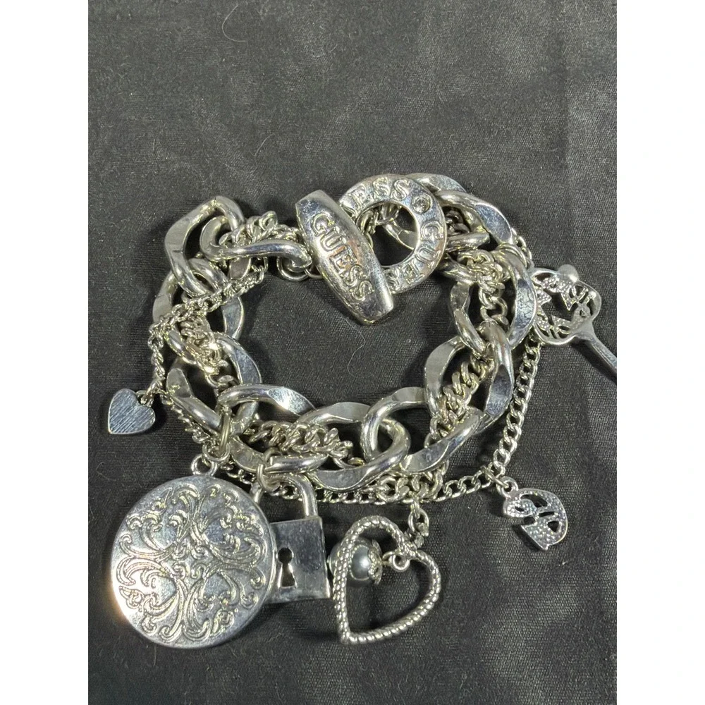 Guess York Silver Tone Multi Strand Charm Bracelet Heart Lock Key Toggle Clasp